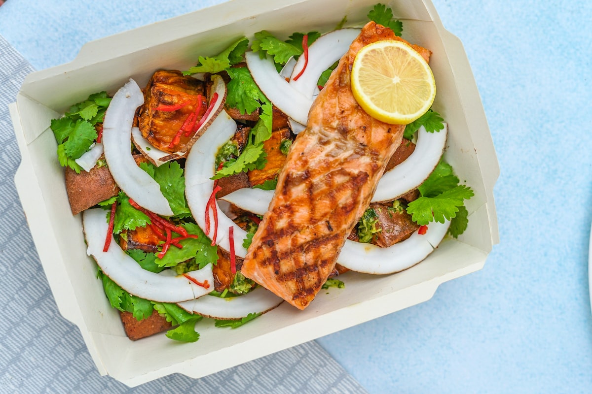 Mediterranean vegetable and fish dishes showcasing heart-healthy cooking